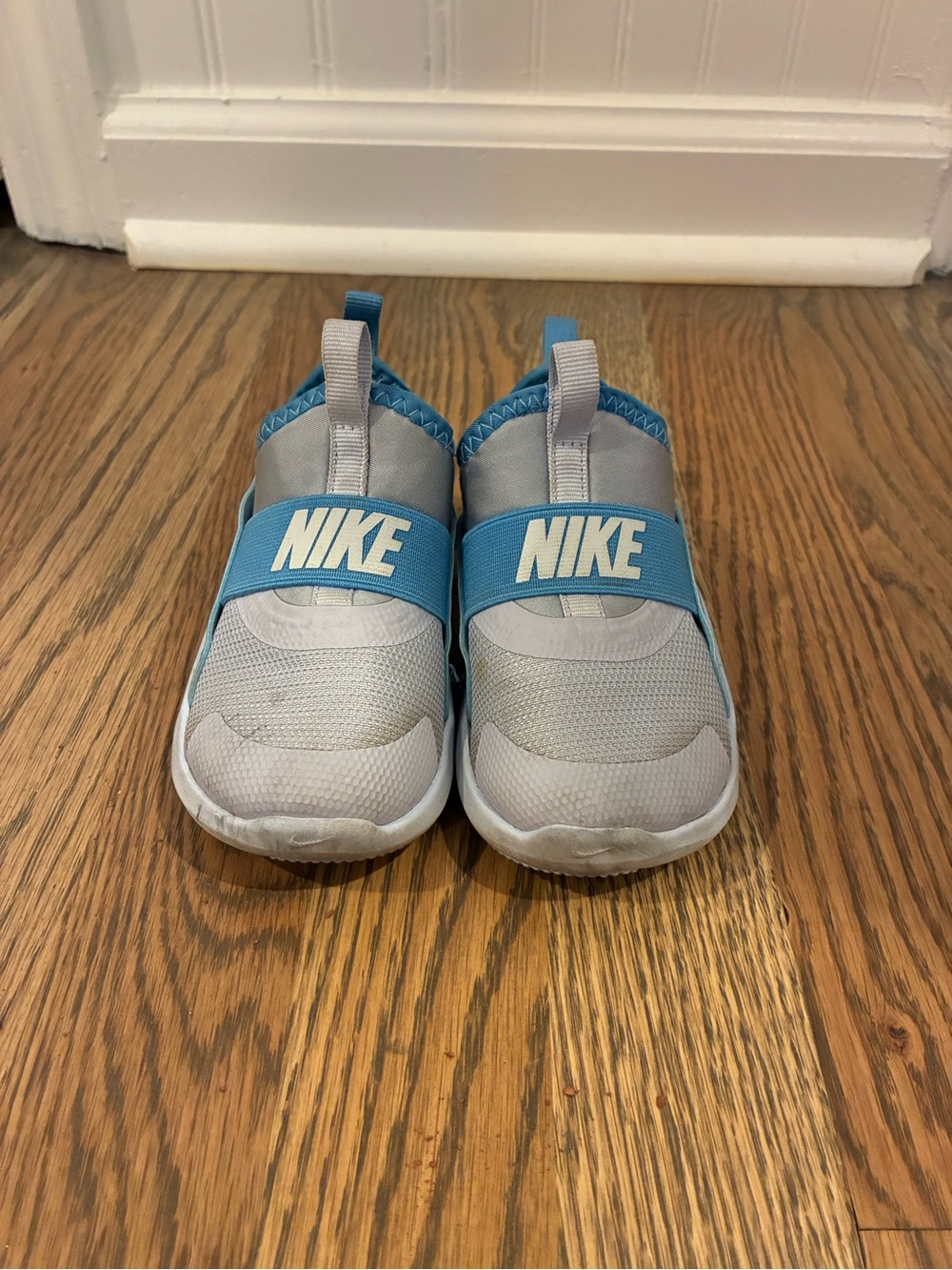 Nike Kids Slip-On Sneakers in Light Gray and Blue Strap